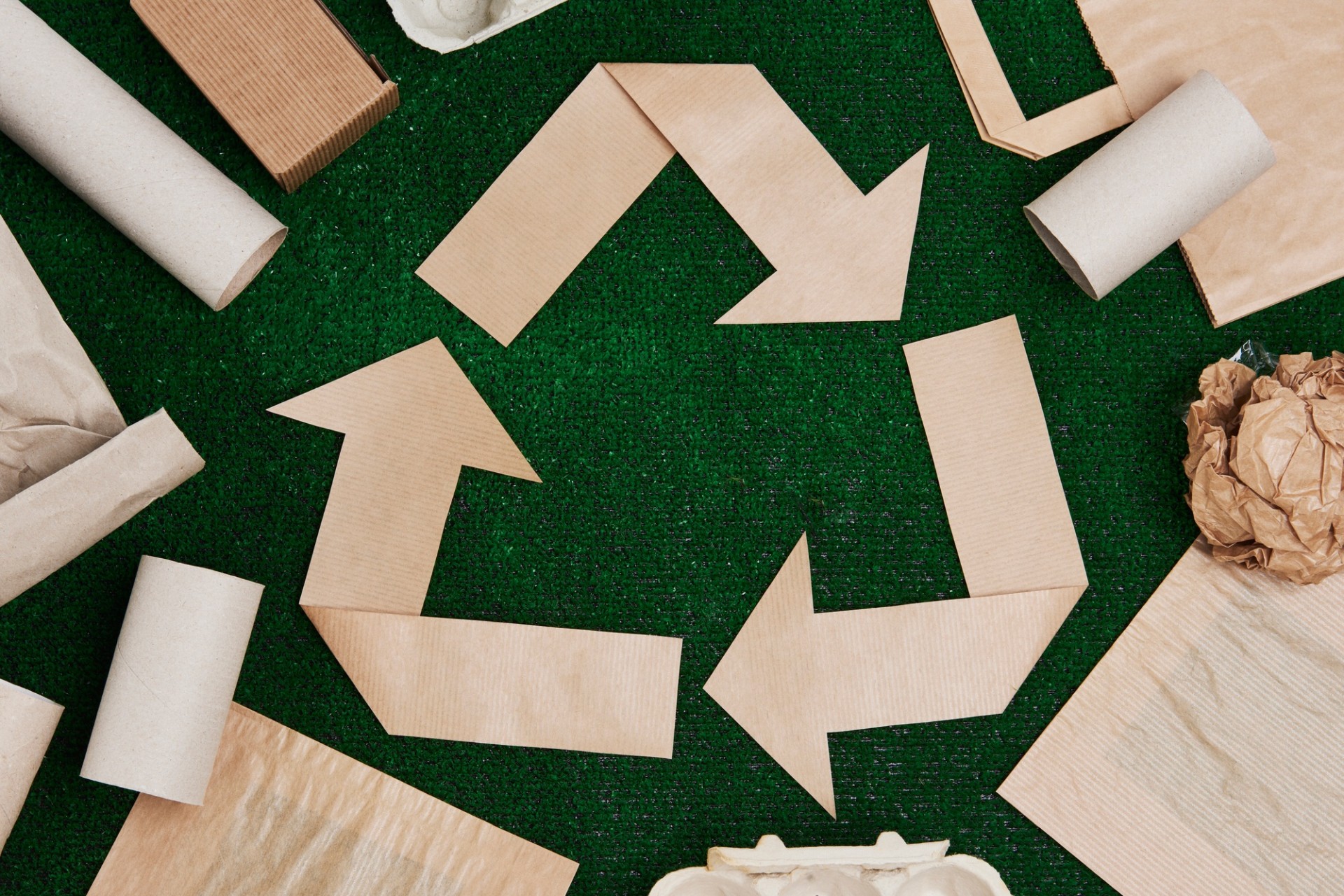 Recycling symbol made of paper